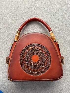 Handcrafted Brown Leather Circle Tote with Embossed Mandala